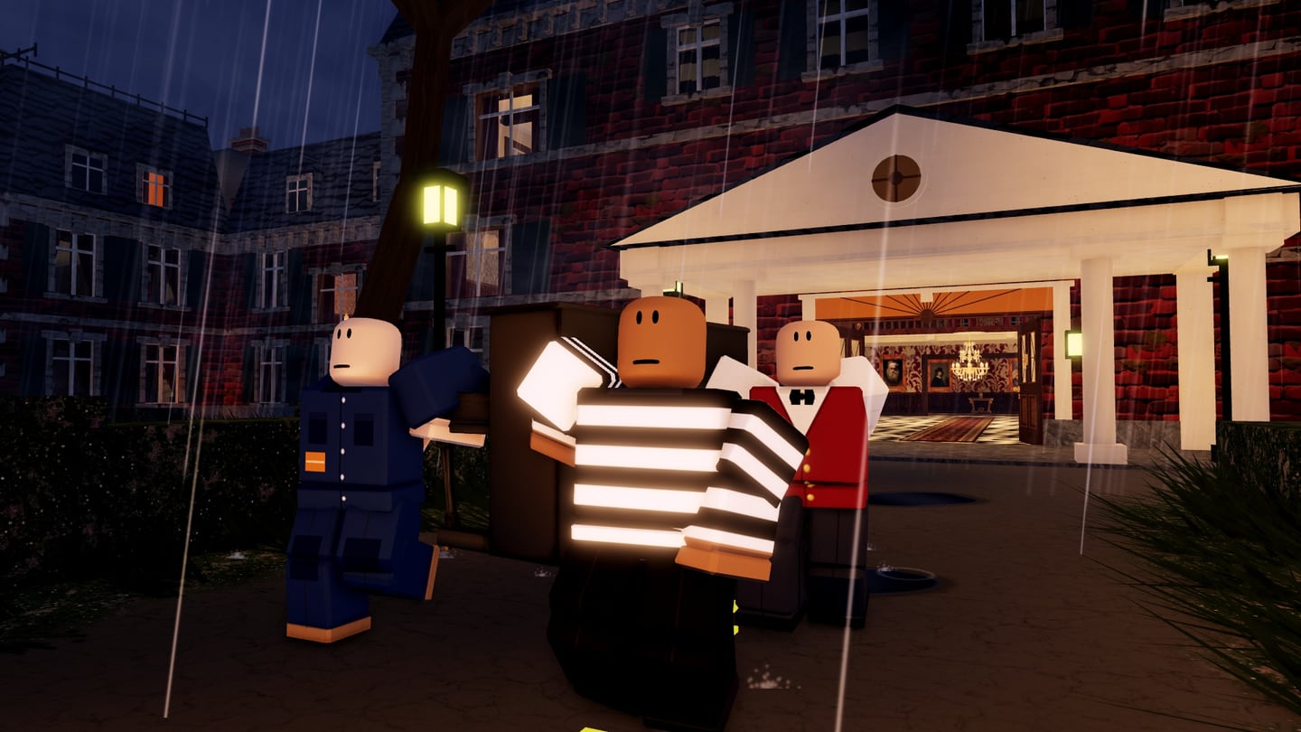 A mover, a striped burglar and one of the house's interns in livery carrying the upright piano out of the manor in the rain.